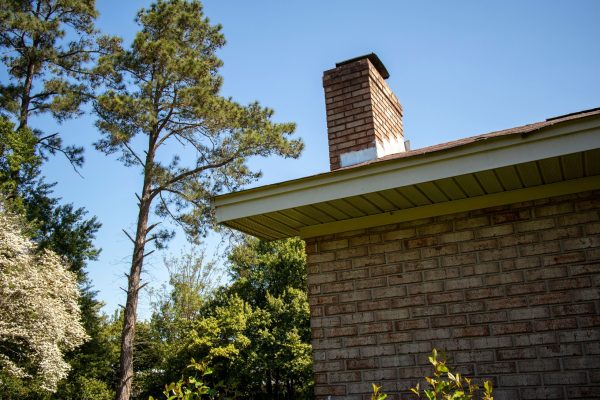 Augusta, Ga USA - 04 01 21: Chimney on the roof of a suburban home